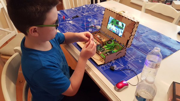 A kid building the Piper Computer Kit.
