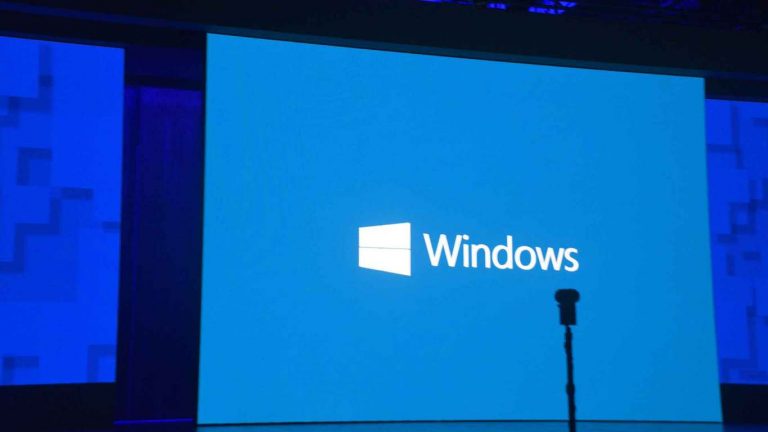 A white windows logo on a blue background