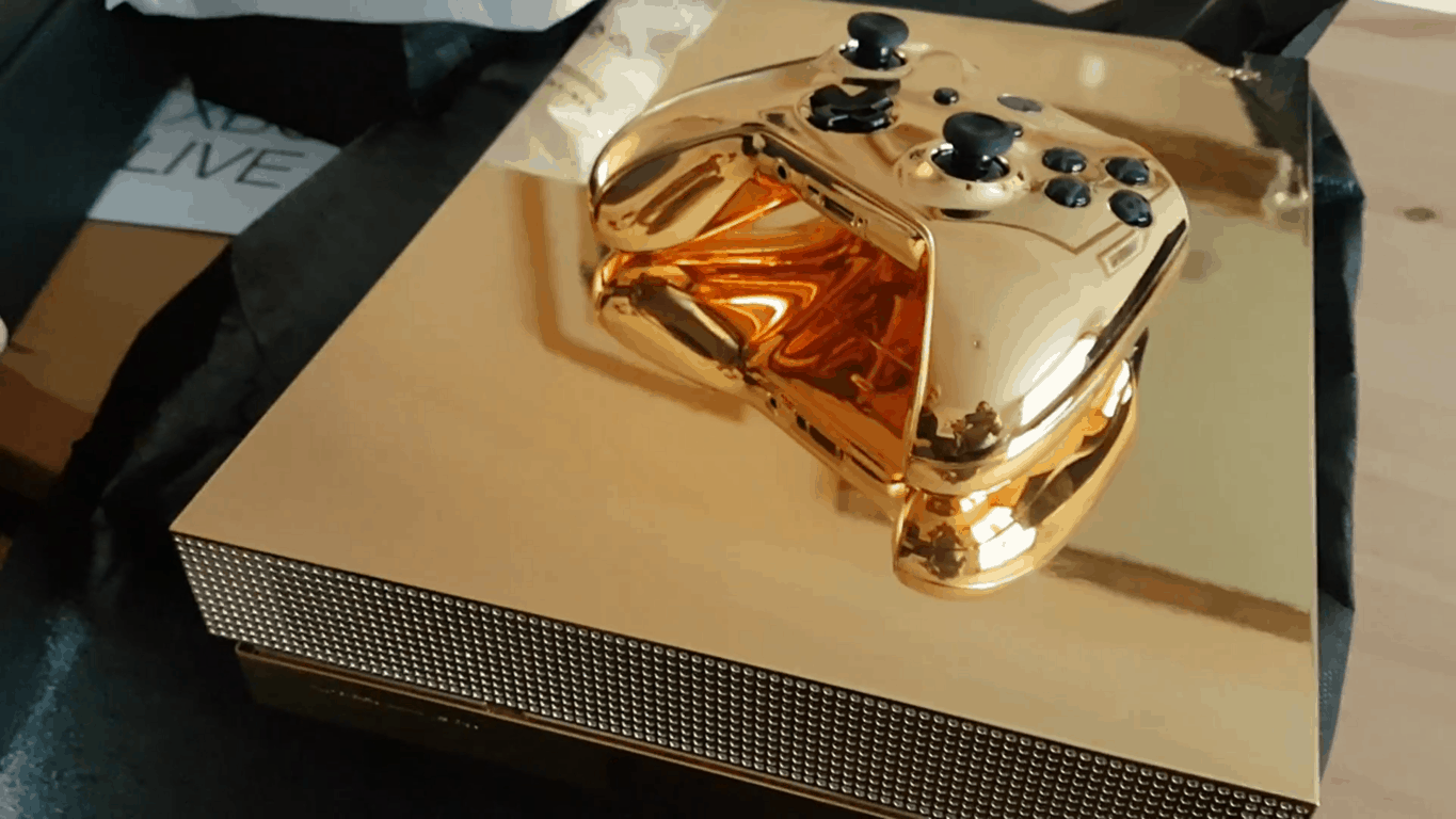 Watch this lucky guy unbox his 24-karat gold-plated xbox one x - onmsft. Com - march 26, 2018