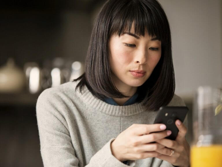 Woman Using A Smartphone