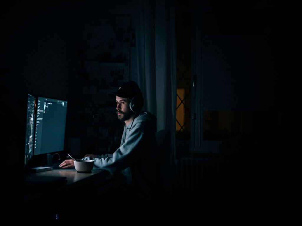 man-working-late-into-evening-feature-image